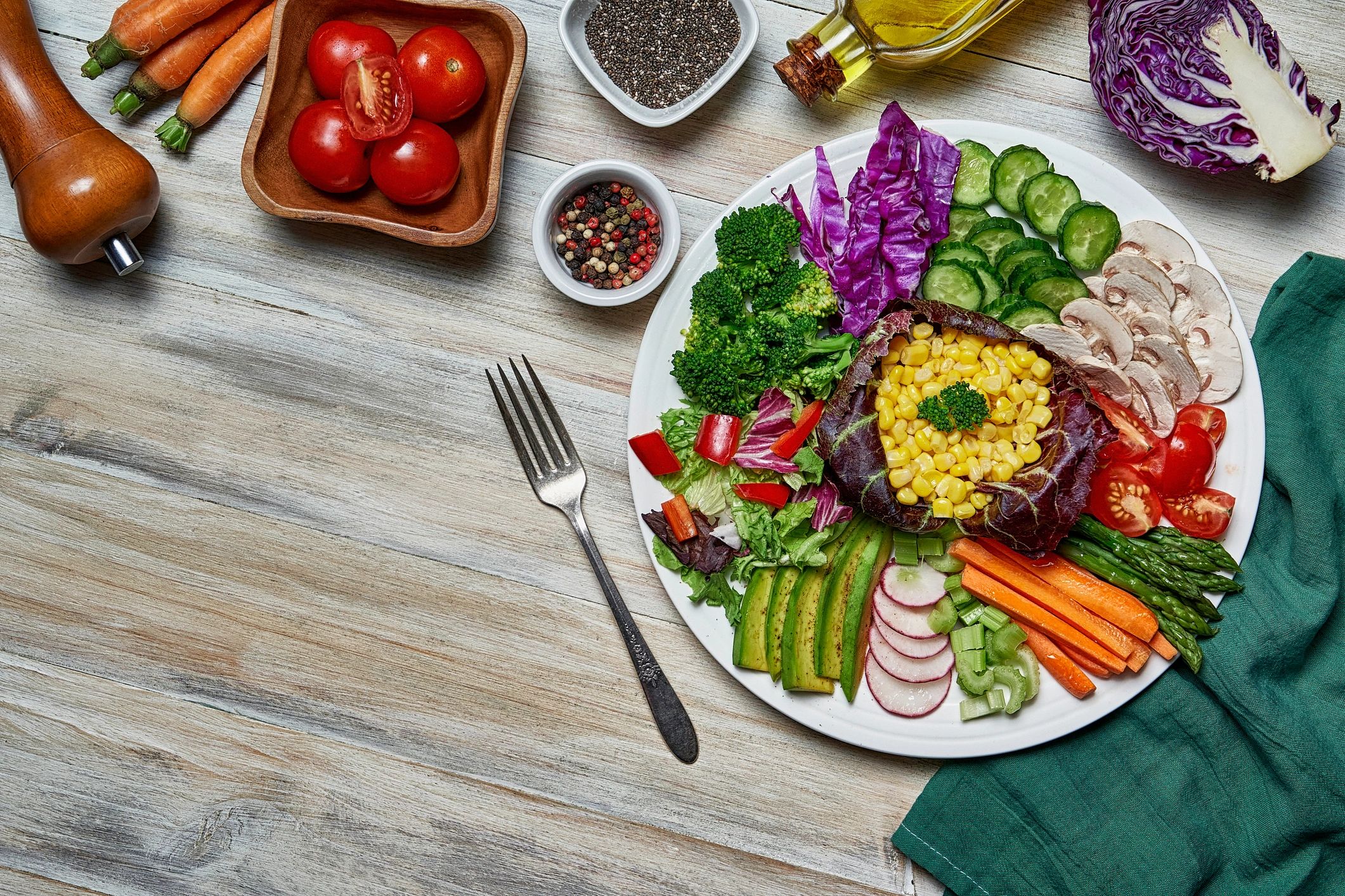 Healthy meal prep ingredients arranged neatly on a rustic table